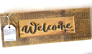 Welcome sign on barnwood